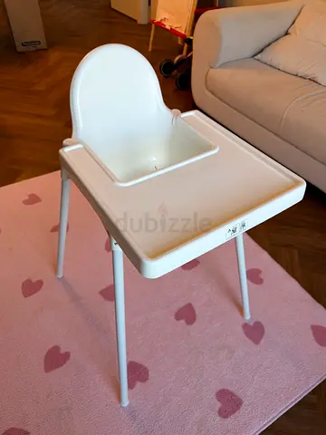 Simple white baby high chair — lightweight plastic seat with tray IKEA ANTILOP