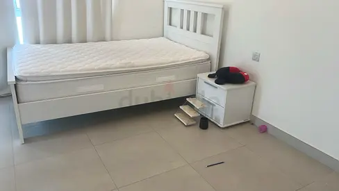 Single white wooden bed with mattress and bedside drawer - good condition