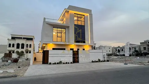 Two-story villa with a rooftop terrace and elevator, freehold, available to all nationalities. Price includes electricity, water, and air conditioning
