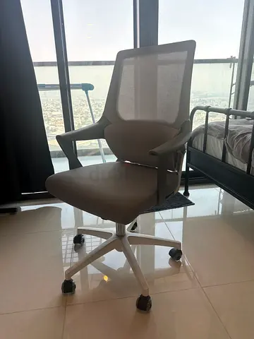 Grey mesh ergonomic office chair