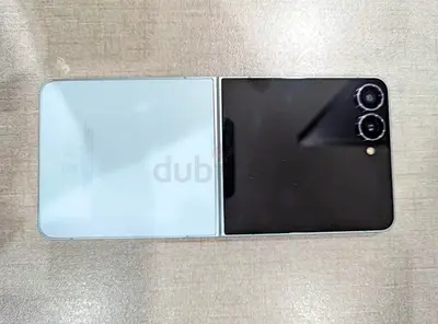 Like-new white foldable smartphone with dual rear cameras