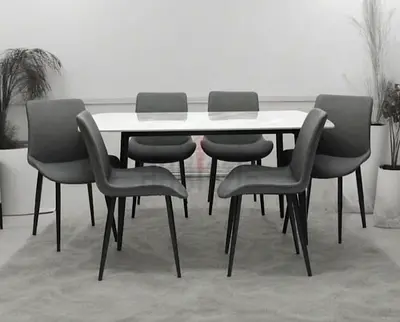 Brand new Top marble dinning Table with 6 Chairs Available