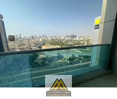 Annual rent: 2-bedroom apartment in City Tower, Al Nuaimiya 3, balcony, free parking, great view, AED 40,000, payable in 4 installments.