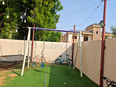 Outdoor metal swing set for kids — simple two-seat frame