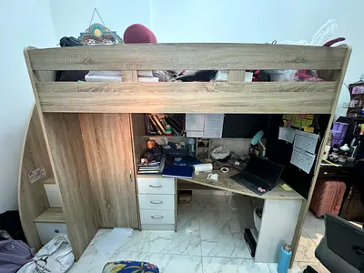 Wooden loft bed with built-in wardrobe, desk and storage - single size