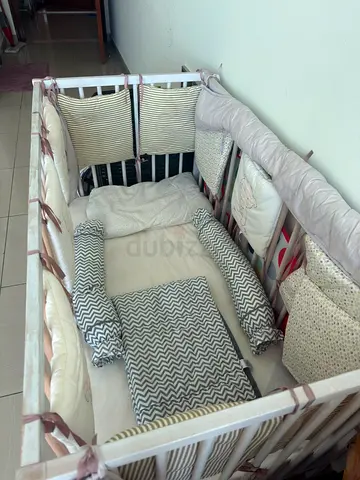 Wooden Baby Crib with Cushioned Bumpers and Mattress - Good Condition