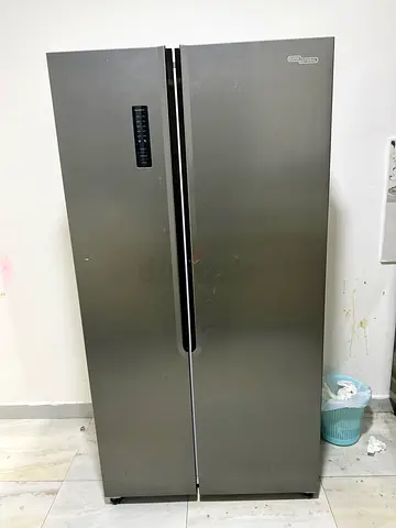 Grey double-door side-by-side refrigerator, good working condition