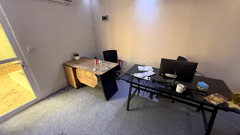Small furnished office setup with desks and chairs - ready to use