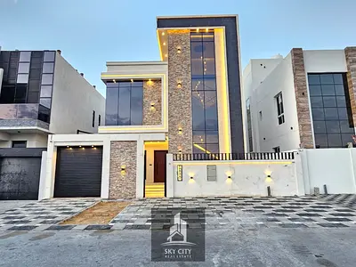 Luxury modern villa for sale in Al Yasmeen, Ajman, featuring an elegant contemporary design, premium