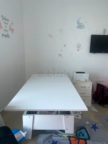 White rectangular adjustable /table in good condition