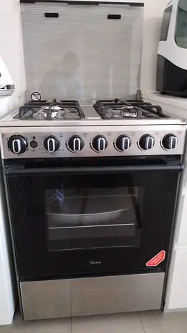 Midea freestanding gas cooker with oven - good working condition