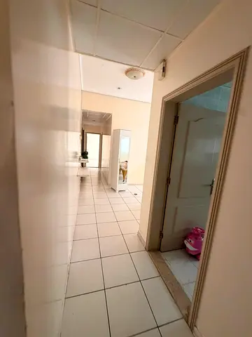For rent in Al Majaz 3 near the park: 2-bedroom apartment with 2 living rooms, 2 bathrooms, balcony. AED 42,000/year, contract attestation included.