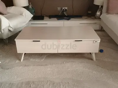 White wooden coffee table with storage drawers - excellent condition