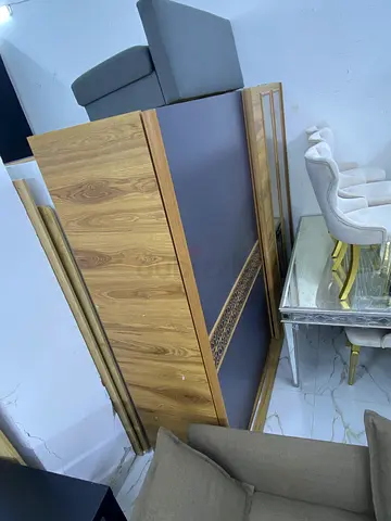 Wooden platform bed frame with hidden storage, good condition