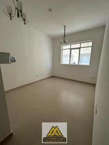 Annual rent, Liwara 2 Ajman, 1BR apartment with balcony, master room, 2 baths, AED 32K, 4 payments.