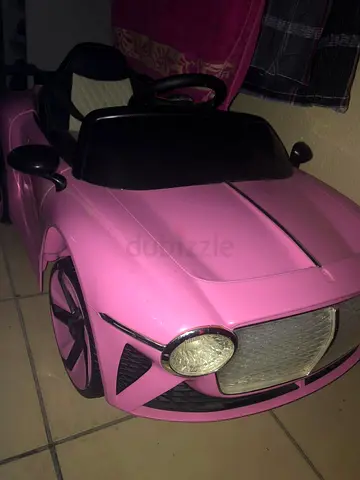 Pink electric ride-on toy car for kids — 12V, single seat
