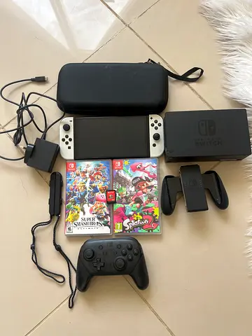 Nintendo Switch OLED console bundle with dock, Pro Controller and 2 games