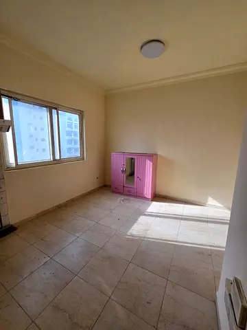 Spacious studio in Al Shuwaiheen with central air conditioning. Annual rent is 16,000, payable in 4