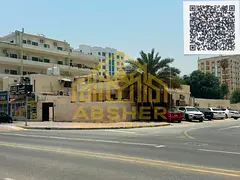 Residential-commercial plot in Al Rashidiya 3, Ajman; permitted for ground floor plus 4 upper floors