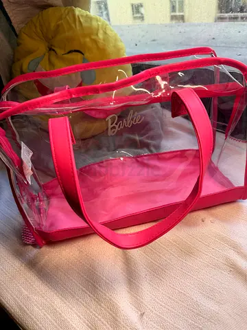 Clear pink Barbie tote bag with handles