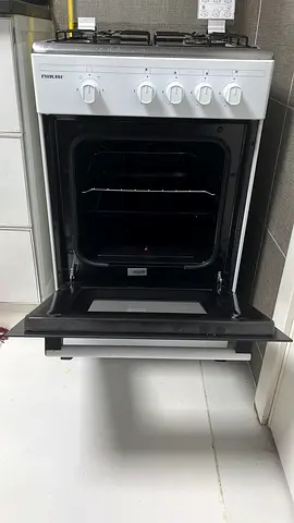 Nikai 4-burner Gas Cooker with Oven - Good Working Condition