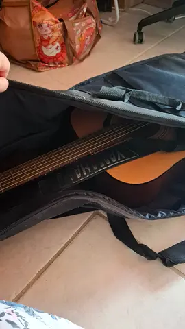 Yamaha F310 acoustic guitar for sale (with stand)