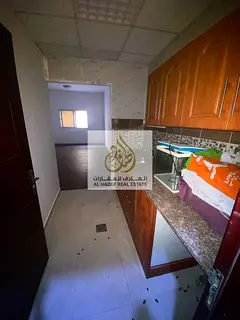 Al Jurf 2, opposite Ajman Court, with gym, swimming pool, parking, and close to all services.
