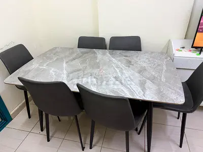 6-seater grey marble-effect dining table with chairs - good condition