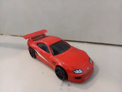 Red Toyota Supra diecast hotwheels treasure hunt (single) - used