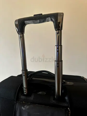 Black carry-on suitcase with telescopic handle - good condition