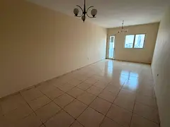 Two bedrooms and a living room for annual rent in Al Nahda - Sharjah | 2 balconies with open views |