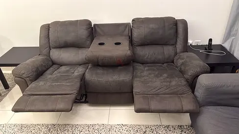 Three-seater reclining sofa with center console and cup holders - grey