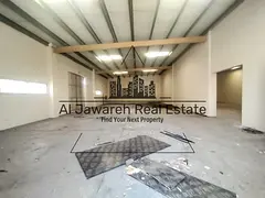 Two adjacent warehouses, 5,000 square feet, with 54 kW of electricity.