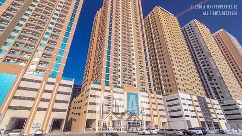 Modern 2 Bedroom Hall Apartment with Covered Parking for Rent in Paradise Lake Towers B9, Emirates City Ajman