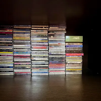 Collection of Music CDs Featuring Various Artists and Genres