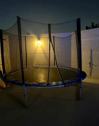 5ft Outdoor Trampoline with Safety Net - Good Condition