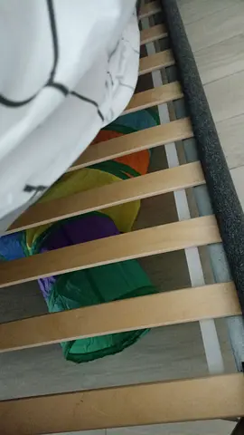 Queen bed frame with wooden slats — good condition