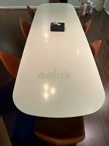 White modern dining table can be adjusted with brown chairs - good condition