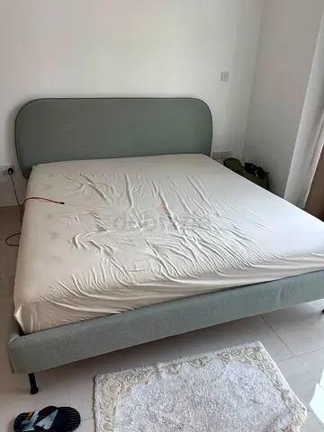 IKEA Light green upholstered double bed frame with headboard - good condition