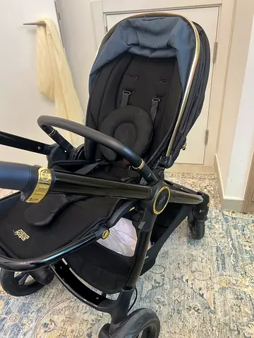 Comfy black baby stroller/pram in good condition