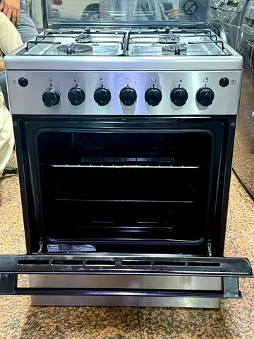 Stainless Steel 4-Burner Gas Cooker with Oven - Good Working Condition