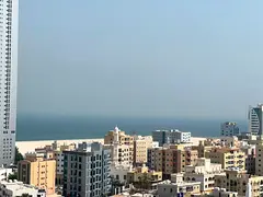 Two-bedroom apartment with a living room on Ajman Corniche, second row from the sea. Two master bedr