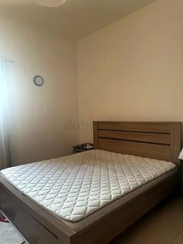 Queen wooden bed frame with mattress - good condition