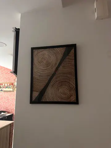 Framed Abstract Wall Art with Circular Wood-Grain Design