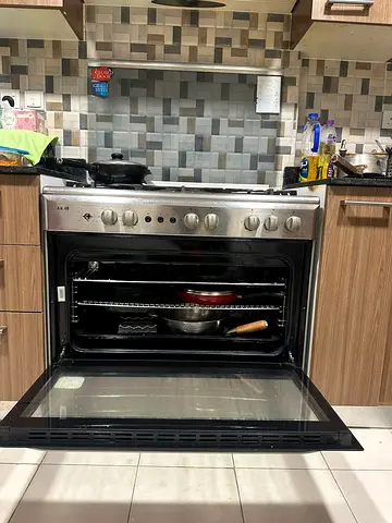 Used Stainless Steel Gas Oven with Built-in Cooktop - Good Condition