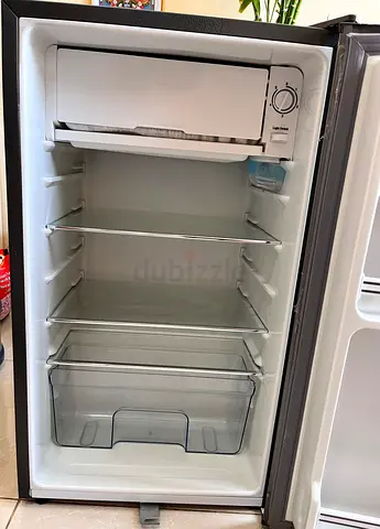 Small single-door refrigerator with freezer compartment - good condition