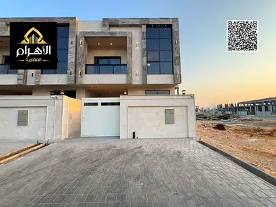 Villa for sale, including registration and ownership fees, near all services, close to Sheikh Mohammed Bin Zayed Road, on a main street, very prime lo