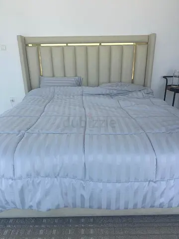 King upholstered bed frame with padded headboard - light beige and a new mattress
