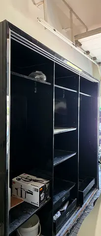 Black wardrobe Needs repair going almost free