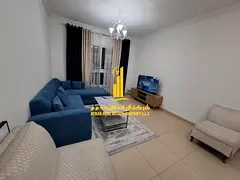 Luxury apartment, second occupancy, one bedroom and living room with a balcony and open view. Ajman,